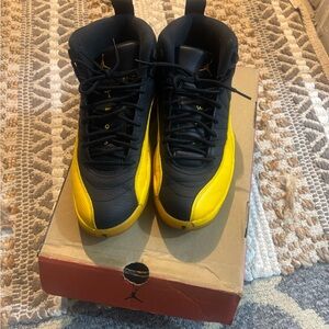 Jordan 12 Retro in Black and University Gold